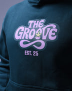 NotYourSize2025 oversized hoodie for women in dark color with The Groove graphic and EST 25 text
