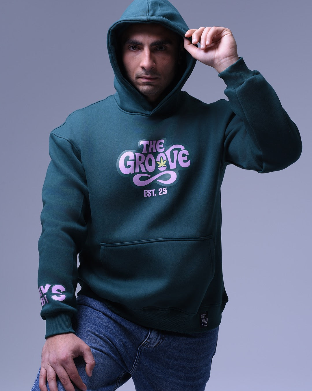 NotYourSize2025 oversized hoodie for women in dark green with The Groove graphic and hooded design